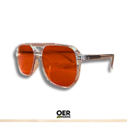 Slaap beter met de Oerjongens Blue Blocker bril. Filter blauw licht, stimuleer melatonine en word uitgerust wakker. Kies oranje of rode lenzen voor jouw avondroutine.