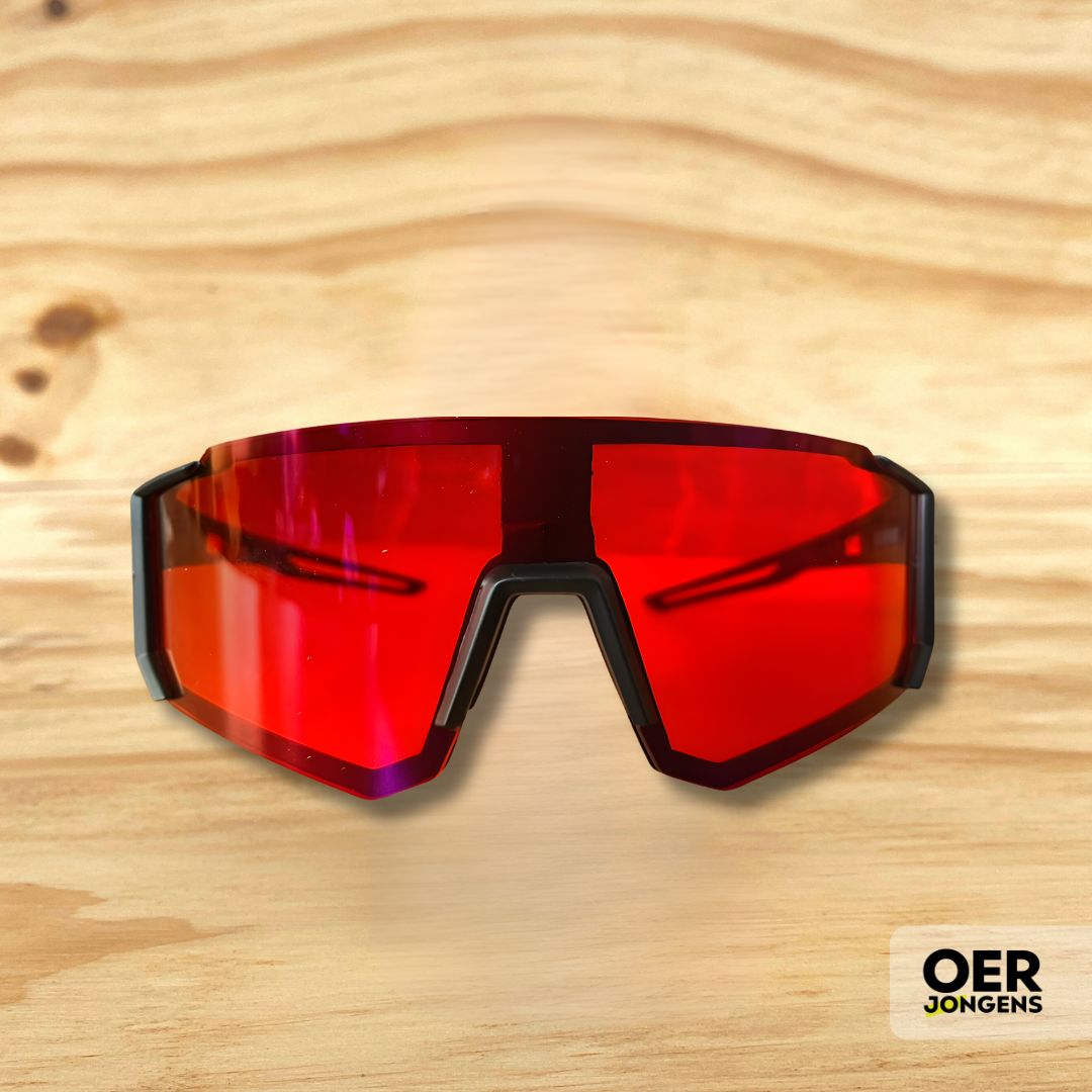 Oerjongens rood-lens slaapbril ontworpen om schermstress en melatonineverstoring te verminderen